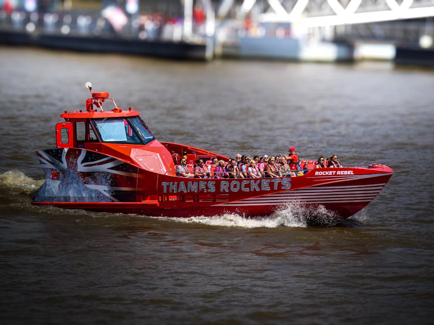 Thrilling Thames Rockets speedboat tour with passengers enjoying the ride along River Thames.