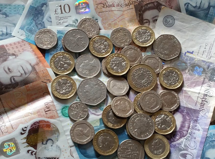 A detailed image of British Pound Sterling coins and banknotes, perfect for finance-related projects.